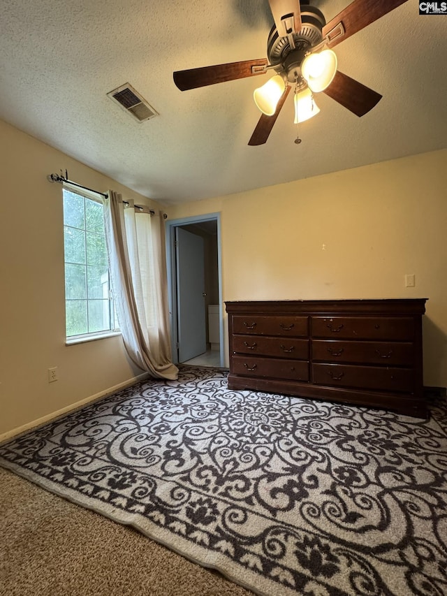 21 Forestgate Ct, Columbia, SC 29212 - unfurnished bedroom featuring light colored carpet, a textured ceiling, a ceiling fan, and baseboards