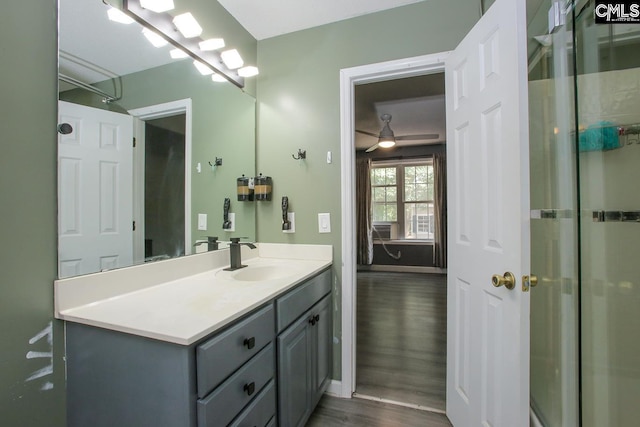 173 Rosewood Ln, Lexington, SC 29072 - bathroom featuring wood finished floors, vanity, and baseboards