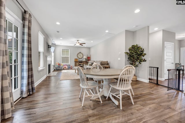 556 Harbour Pointe Dr, Columbia, SC 29229 - dining room with a ceiling fan, wood finished floors, recessed lighting, baseboards, and a fireplace