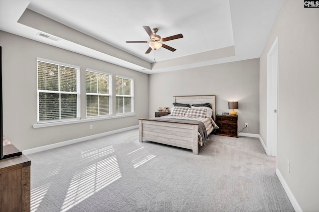 556 Harbour Pointe Dr, Columbia, SC 29229 - bedroom with carpet flooring, baseboards, a tray ceiling, and a ceiling fan