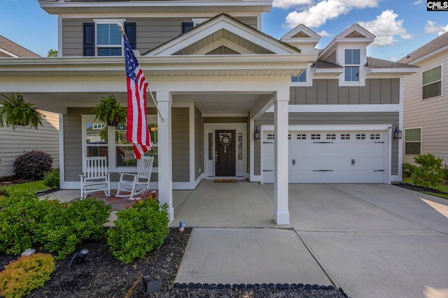 556 Harbour Pointe Dr, Columbia, SC 29229 - view of front of house with covered porch, concrete driveway, and board and batten siding