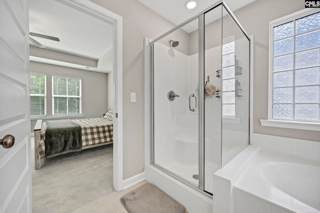 556 Harbour Pointe Dr, Columbia, SC 29229 - ensuite bathroom featuring a bath, a stall shower, and a ceiling fan