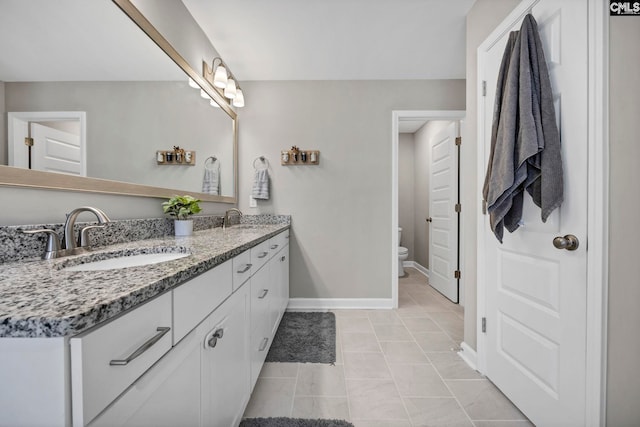 556 Harbour Pointe Dr, Columbia, SC 29229 - full bath with double vanity, toilet, baseboards, and tile patterned floors