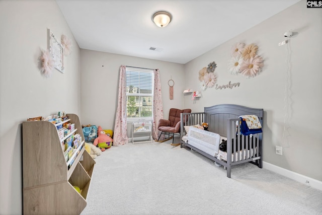 556 Harbour Pointe Dr, Columbia, SC 29229 - bedroom featuring carpet floors, a nursery area, and baseboards