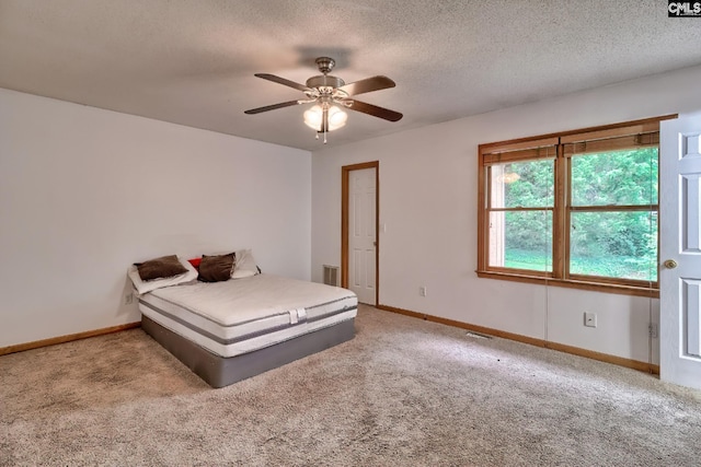 519 Cockspur Rd, Irmo, SC 29063 - bedroom featuring carpet flooring, baseboards, a textured ceiling, and ceiling fan
