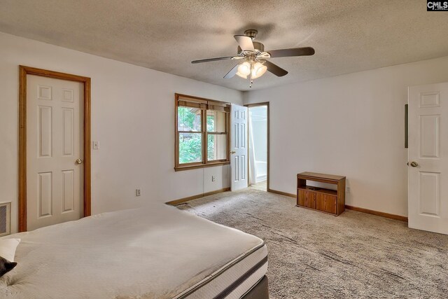 519 Cockspur Rd, Irmo, SC 29063 - carpeted bedroom with baseboards, a textured ceiling, and a ceiling fan