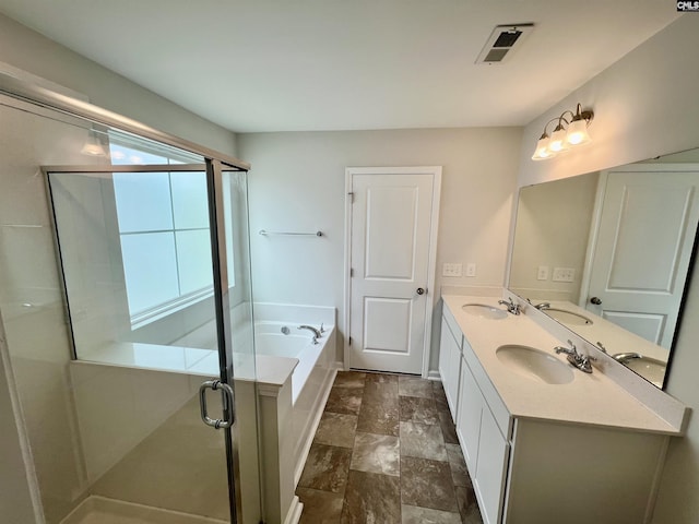 520 Cricket Chirp Ln, Elgin, SC 29045 - full bath featuring double vanity, a garden tub, a shower stall, and stone finish floors