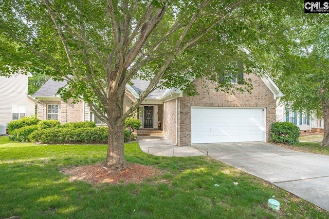 121 Stonemont Dr, Irmo, SC 29063 - view of property hidden behind natural elements featuring brick siding, driveway, a front yard, an attached garage, and central air condition unit