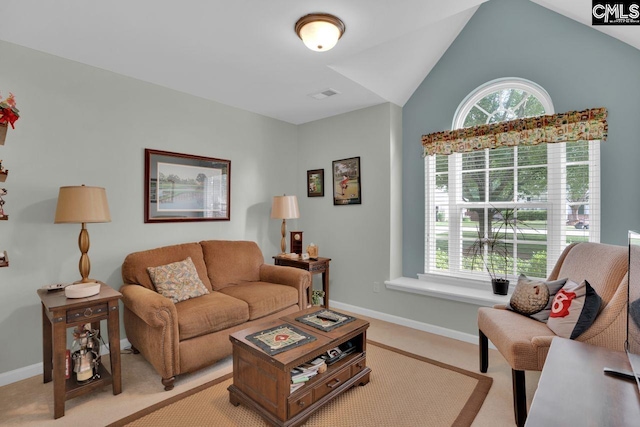 121 Stonemont Dr, Irmo, SC 29063 - living area with light colored carpet, baseboards, and lofted ceiling