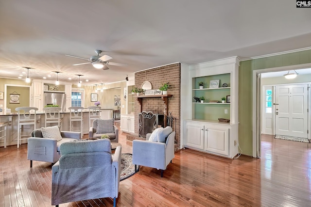 1108 Tarrytown Ln, West Columbia, SC 29170 - living area with healthy amount of natural light, a ceiling fan, hardwood / wood-style floors, and ornamental molding