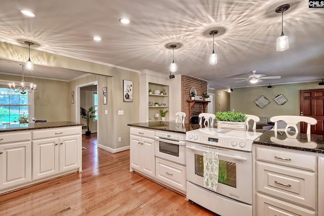 1108 Tarrytown Ln, West Columbia, SC 29170 - kitchen featuring white appliances, ceiling fan, ornamental molding, white cabinetry, and a fireplace