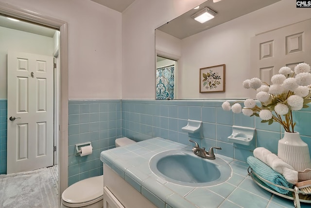 1108 Tarrytown Ln, West Columbia, SC 29170 - full bathroom with tile walls, vanity, toilet, and a wainscoted wall