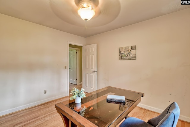 1108 Tarrytown Ln, West Columbia, SC 29170 - home office with light wood-style flooring, baseboards, and a ceiling fan