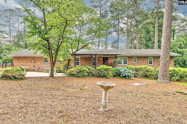 1108 Tarrytown Ln, West Columbia, SC 29170 - ranch-style home with brick siding and a patio