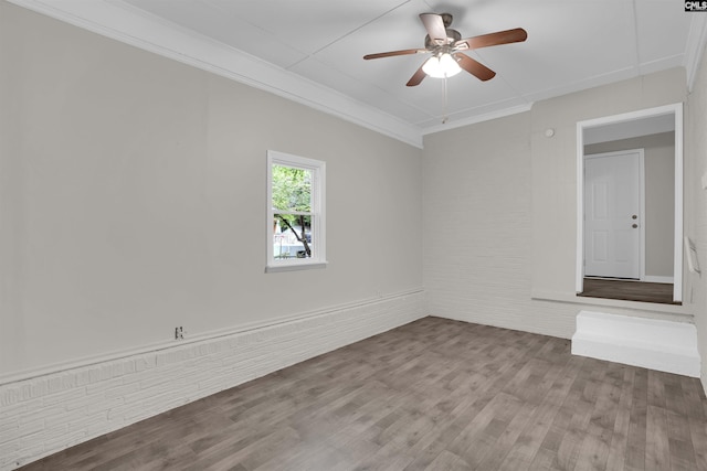 2136 Windale Dr, Columbia, SC 29223 - spare room featuring wood finished floors, a ceiling fan, and ornamental molding