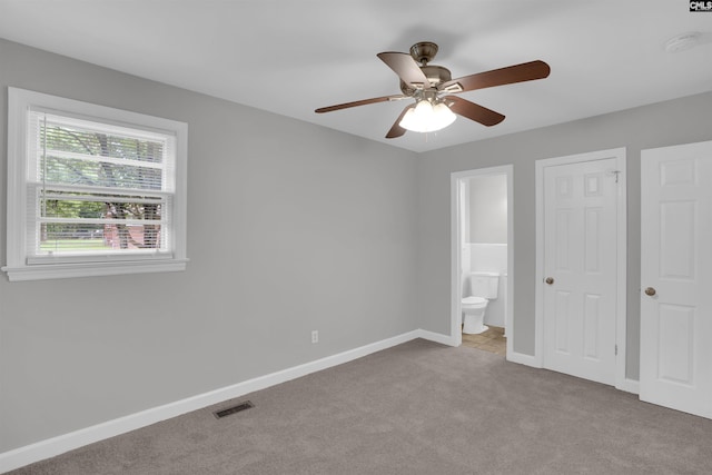 2136 Windale Dr, Columbia, SC 29223 - unfurnished bedroom featuring carpet flooring, baseboards, connected bathroom, and ceiling fan