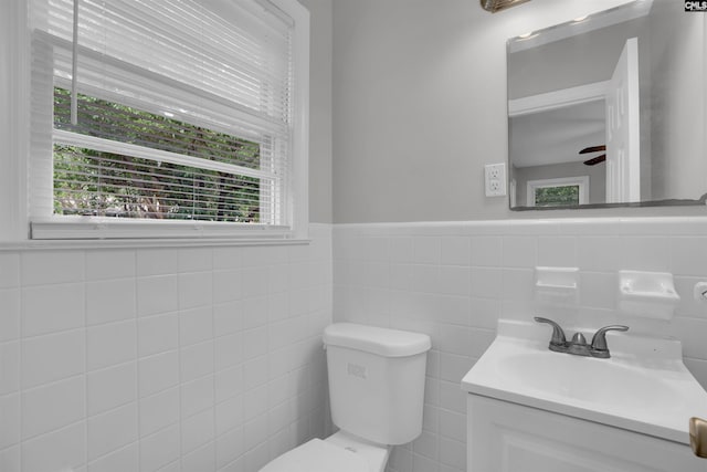 2136 Windale Dr, Columbia, SC 29223 - half bathroom with toilet, vanity, tile walls, and wainscoting