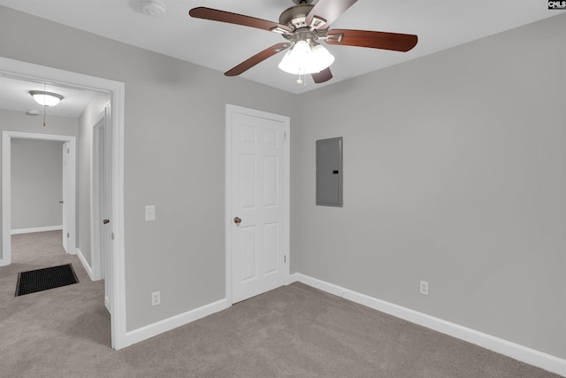 2136 Windale Dr, Columbia, SC 29223 - unfurnished bedroom with electric panel, carpet flooring, baseboards, and ceiling fan
