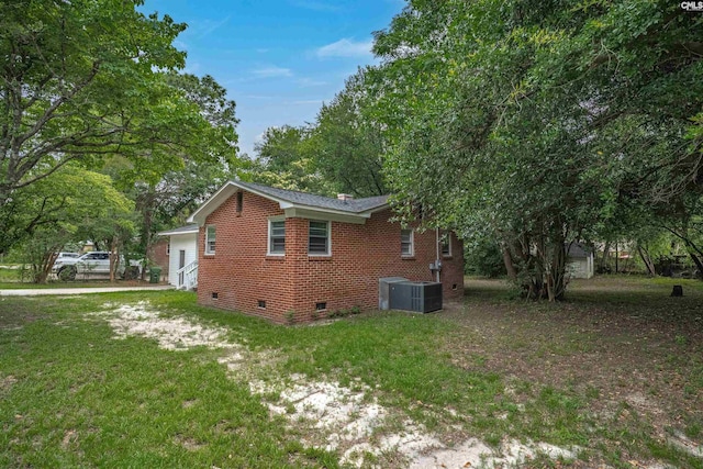 2136 Windale Dr, Columbia, SC 29223 - view of side of property with crawl space, brick siding, a yard, and central air condition unit