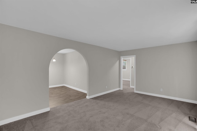 2136 Windale Dr, Columbia, SC 29223 - carpeted empty room with arched walkways and baseboards