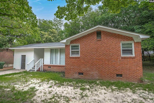 2136 Windale Dr, Columbia, SC 29223 - back of property featuring crawl space, brick siding, and view of wooded area