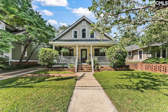2909 Columbia Ave, Columbia, SC 29201 - view of front of property with covered porch and a front yard