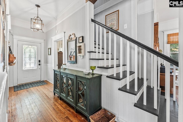 2909 Columbia Ave, Columbia, SC 29201 - foyer featuring hardwood / wood-style flooring, crown molding, stairs, and a chandelier