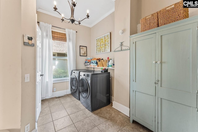2909 Columbia Ave, Columbia, SC 29201 - laundry room with washing machine and dryer, crown molding, baseboards, a chandelier, and light tile patterned flooring