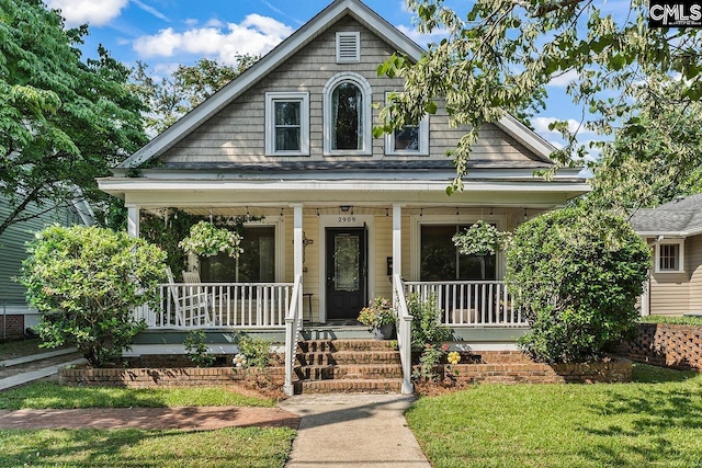 2909 Columbia Ave, Columbia, SC 29201 - view of front of property with a porch and a front lawn