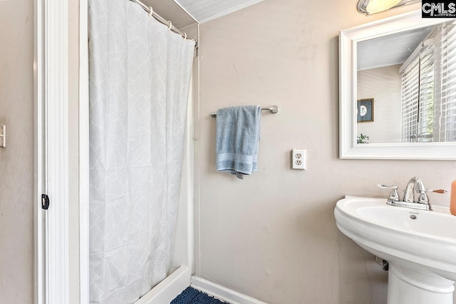 2909 Columbia Ave, Columbia, SC 29201 - bathroom featuring a shower with shower curtain and a sink
