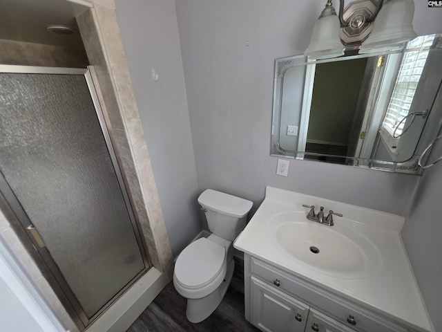 804 Dogwood St, Cayce, SC 29033 - bathroom with toilet, vanity, a shower stall, and wood finished floors