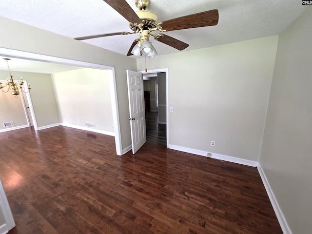 804 Dogwood St, Cayce, SC 29033 - empty room featuring a chandelier, wood finished floors, and baseboards