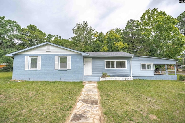 7149 Nancy Ave, Columbia, SC 29223 - view of front facade with crawl space, a front yard, and brick siding