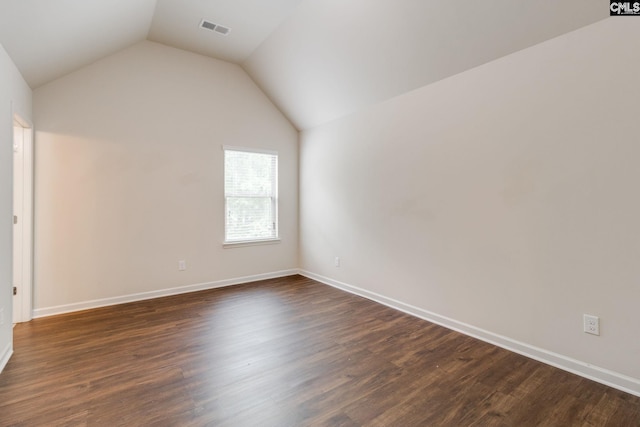 757 Garrett Way, Columbia, SC 29229 - unfurnished bedroom with vaulted ceiling, dark wood-style flooring, and baseboards