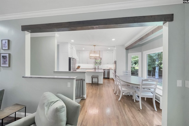 315 Poindexter Ln, Lexington, SC 29072 - dining space featuring ornamental molding, a chandelier, light wood-style floors, and recessed lighting