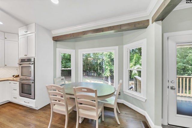 315 Poindexter Ln, Lexington, SC 29072 - dining space featuring crown molding and wood finished floors