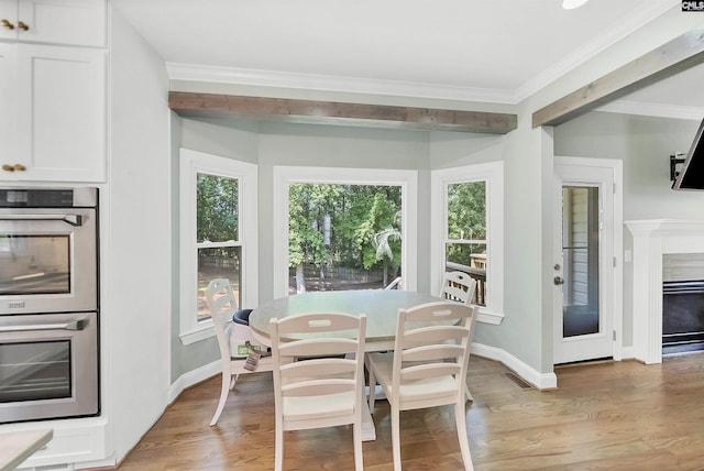 315 Poindexter Ln, Lexington, SC 29072 - dining space with ornamental molding, light wood finished floors, and baseboards