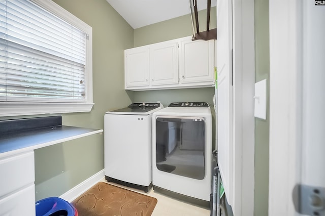 315 Poindexter Ln, Lexington, SC 29072 - laundry area featuring washing machine and dryer, cabinet space, and baseboards
