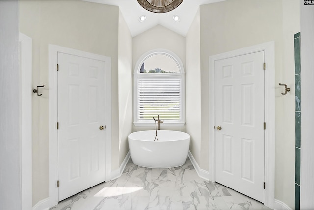 315 Poindexter Ln, Lexington, SC 29072 - full bathroom featuring marble finish flooring, a freestanding tub, baseboards, and vaulted ceiling