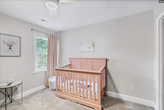 315 Poindexter Ln, Lexington, SC 29072 - bedroom with light colored carpet, baseboards, and a nursery area