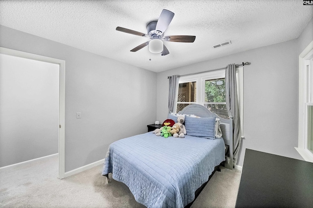 315 Poindexter Ln, Lexington, SC 29072 - carpeted bedroom with ceiling fan, baseboards, and a textured ceiling