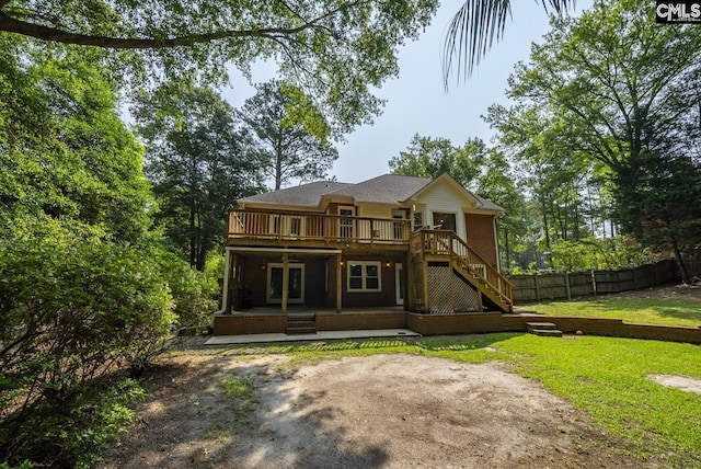 315 Poindexter Ln, Lexington, SC 29072 - rear view of property featuring stairway, a wooden deck, and a patio