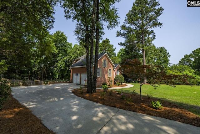 315 Poindexter Ln, Lexington, SC 29072 - view of property exterior featuring concrete driveway, an attached garage, and a lawn