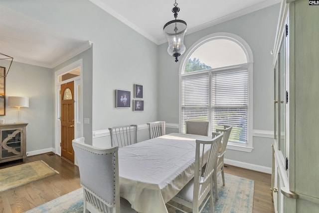 315 Poindexter Ln, Lexington, SC 29072 - dining room with crown molding, wood finished floors, and baseboards