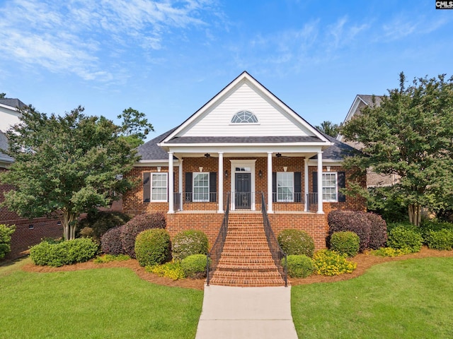 104 Eastshore Dr, Lexington, SC 29072 - greek revival inspired property with a front yard, brick siding, and stairway