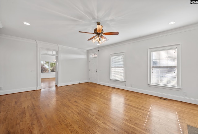 104 Eastshore Dr, Lexington, SC 29072 - unfurnished living room featuring crown molding, ceiling fan, baseboards, light wood-type flooring, and recessed lighting