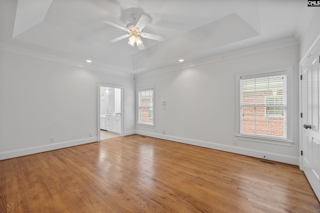 104 Eastshore Dr, Lexington, SC 29072 - unfurnished room featuring crown molding, a ceiling fan, light wood-style flooring, a raised ceiling, and baseboards