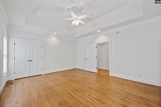 104 Eastshore Dr, Lexington, SC 29072 - empty room featuring a raised ceiling, ceiling fan, light wood-type flooring, crown molding, and recessed lighting