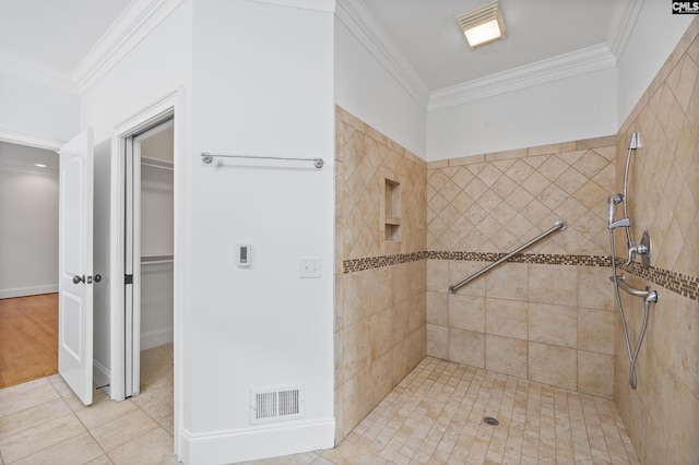 104 Eastshore Dr, Lexington, SC 29072 - full bathroom with crown molding, a tile shower, tile patterned flooring, and a spacious closet
