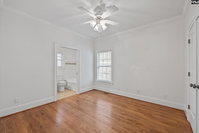 104 Eastshore Dr, Lexington, SC 29072 - unfurnished bedroom with baseboards, ornamental molding, wood finished floors, ensuite bath, and ceiling fan